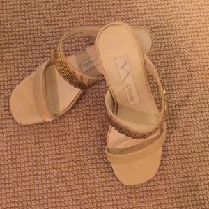 Women’s shoes. 5 1/2. Two inch wide heel. Gold.